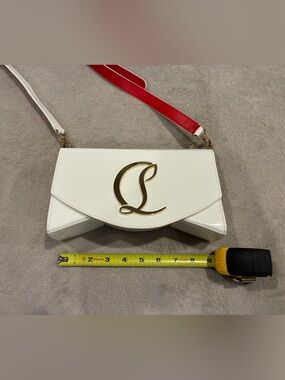 Christian Louboutin White Leather Shoulder Bag with Gold Emblem and Red Strap